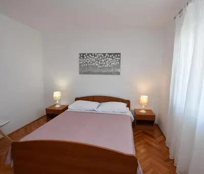 Krevet ili kreveti u jedinici u objektu Apartments Guzela
