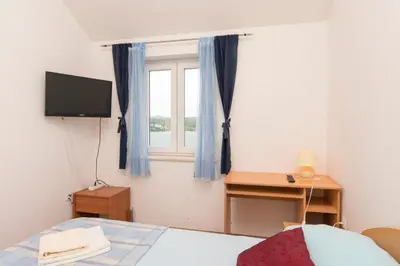 Krevet ili kreveti u jedinici u objektu Apartments Vladimir