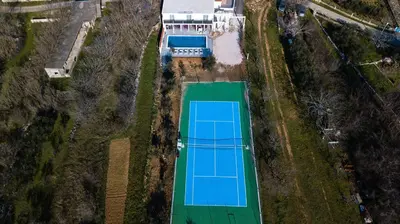 Tereni za tenis i/ili skvoš u sklopu objekta Holiday Home 