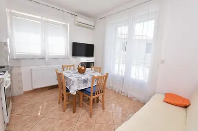 TV i/ili zabavni centar u objektu Apartments Brico