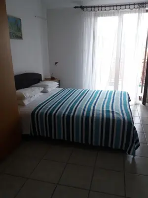 Krevet ili kreveti u jedinici u objektu Apartments by the sea Grebastica, Sibenik - 14476