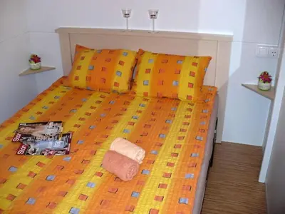 Krevet ili kreveti u jedinici u objektu Victoria Mobilehome Camping Imperial