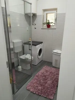 Kupaonica u objektu Apartmani Cobanov Josipa