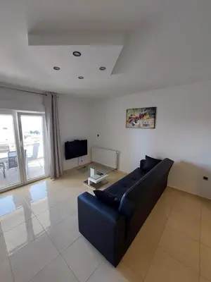 TV i/ili zabavni centar u objektu Apartments Daniel