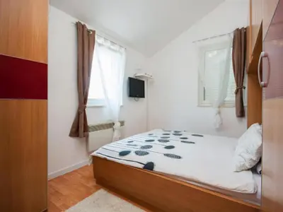 Krevet ili kreveti u jedinici u objektu Deluxe Apartment Toni