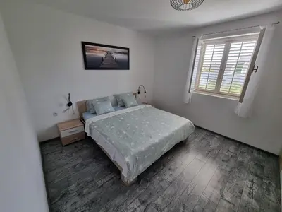 Krevet ili kreveti u jedinici u objektu Apartman Juraga