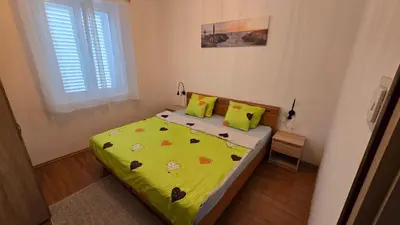 Krevet ili kreveti u jedinici u objektu Apartman Juraga