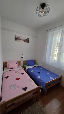 Krevet ili kreveti u jedinici u objektu Apartman Juraga