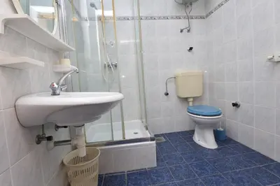 Kupaonica u objektu Apartments and Rooms Jakov