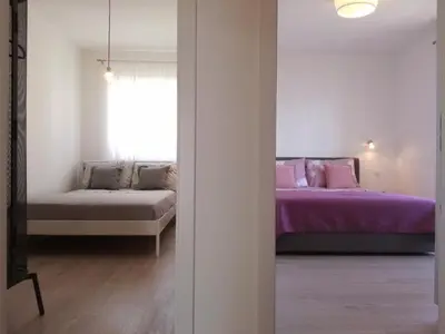 Krevet ili kreveti u jedinici u objektu Quiet Family Apartments 30m from Beach Rogoznica Maiv Residence Zatoglav