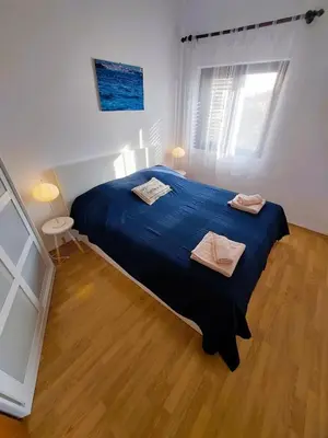 Krevet ili kreveti u jedinici u objektu Apartmani Markoč