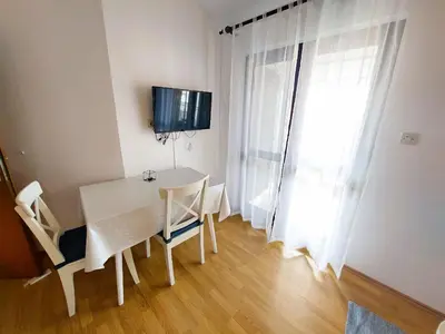 TV i/ili zabavni centar u objektu Apartmani Markoč