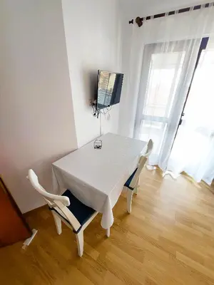 TV i/ili zabavni centar u objektu Apartmani Markoč