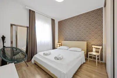 Krevet ili kreveti u jedinici u objektu Regina Apartments