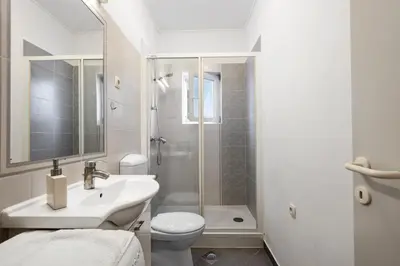 Kupaonica u objektu Regina Apartments
