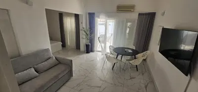 TV i/ili zabavni centar u objektu Guest house Silvija - sea view