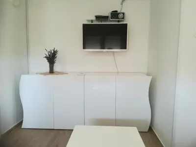 TV i/ili zabavni centar u objektu Summer cottage with breathtaking view