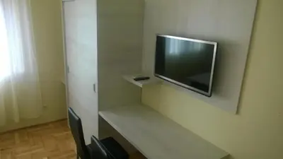 TV i/ili zabavni centar u objektu Rooms & Apartments Blue Beach