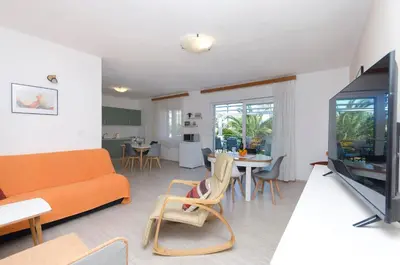 TV i/ili zabavni centar u objektu Apartments and Rooms Antee