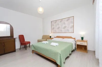Krevet ili kreveti u jedinici u objektu Apartments and Rooms Antee