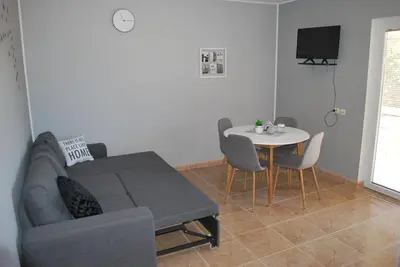 TV i/ili zabavni centar u objektu Apartmani Ivan