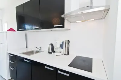 Kuhinja ili čajna kuhinja u objektu Rooms & Apartments Marinero