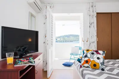 TV i/ili zabavni centar u objektu Hana Home - Apartments Tisno