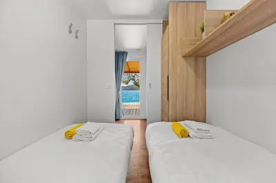 Krevet ili kreveti u jedinici u objektu Amadria Park Deluxe Mobile Home