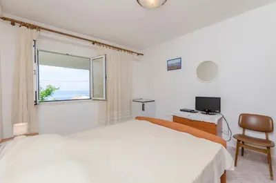 Krevet ili kreveti u jedinici u objektu Apartments and Room Mate-Mare