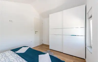 Krevet ili kreveti u jedinici u objektu Four-Bedroom Holiday Home In Sibenik