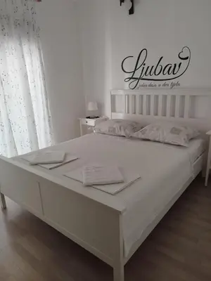 Krevet ili kreveti u jedinici u objektu Apartmani Kraljević