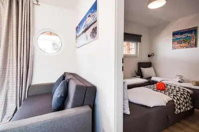 Krevet ili kreveti u jedinici u objektu Croatia Camp Mobile Homes Vodice