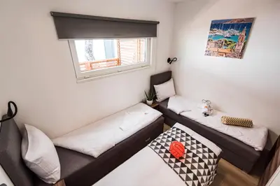 Krevet ili kreveti u jedinici u objektu Croatia Camp Mobile Homes Vodice