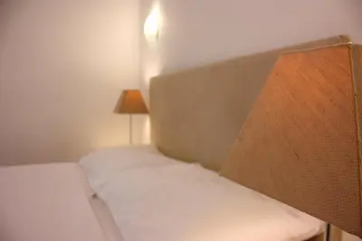 Krevet ili kreveti u jedinici u objektu Medulić Palace Rooms & Apartments