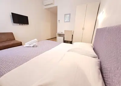 Krevet ili kreveti u jedinici u objektu Medulić Palace Rooms & Apartments