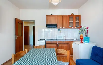 Kuhinja ili čajna kuhinja u objektu Two-Bedroom Apartment In Sibenik