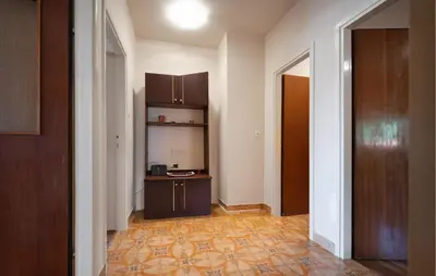Kuhinja ili čajna kuhinja u objektu Two-Bedroom Apartment In Sibenik