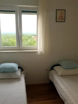 Krevet ili kreveti u jedinici u objektu Kuća za odmor Mile