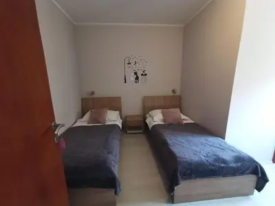 Krevet ili kreveti u jedinici u objektu Apartments & Rooms Krecak Sibenik