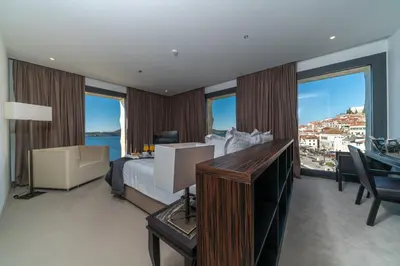 Krevet ili kreveti u jedinici u objektu Bellevue Superior City Hotel