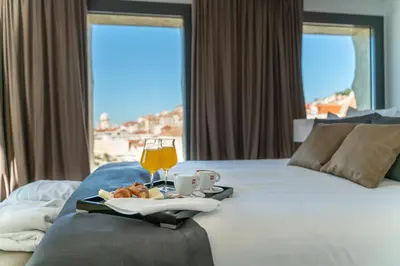 Krevet ili kreveti u jedinici u objektu Bellevue Superior City Hotel
