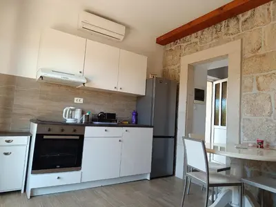 Kuhinja ili čajna kuhinja u objektu Apartment Nada