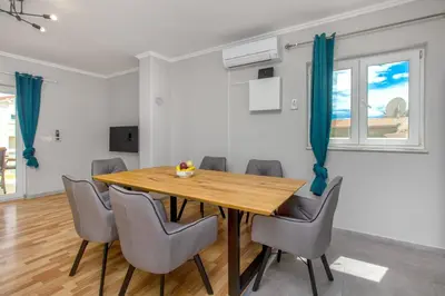 TV i/ili zabavni centar u objektu Apartments Alaga