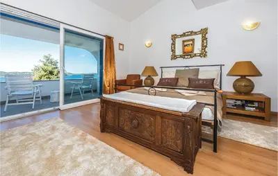 Krevet ili kreveti u jedinici u objektu Three-Bedroom Holiday Home In Zaboric
