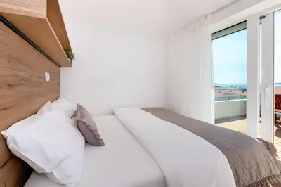 Krevet ili kreveti u jedinici u objektu Seaview Apartments Tihi II