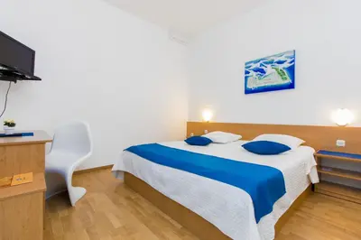 Krevet ili kreveti u jedinici u objektu Apartments by the sea Brodarica, Sibenik - 479