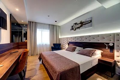 Krevet ili kreveti u jedinici u objektu Hotel Scala d'Oro