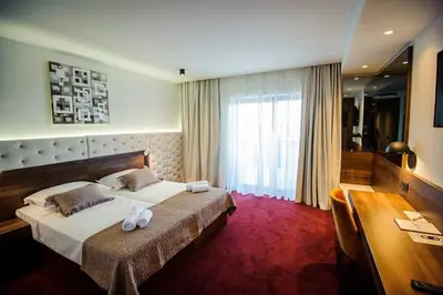 Krevet ili kreveti u jedinici u objektu Hotel Scala d'Oro