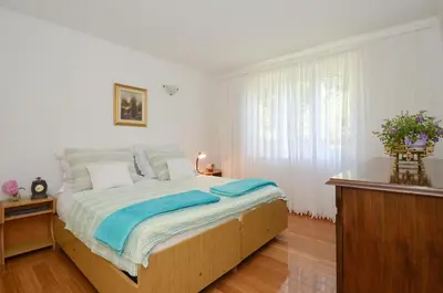 Krevet ili kreveti u jedinici u objektu Apartment Wisteria