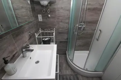 Kupaonica u objektu Dandy apartment with pool 2 bedrooms